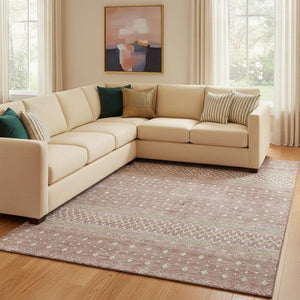 HomeRoots 10' X 14' Blush and Ivory Tribal Area Rug - UV Protected, Washable, Durable, and Soft for Family Spaces 657161