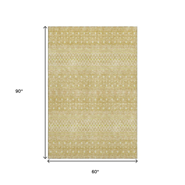 HomeRoots 5' X 8' Gold and Ivory Tribal Area Rug – Washable, UV-Protected, Perfect for High-Traffic Spaces! 657169