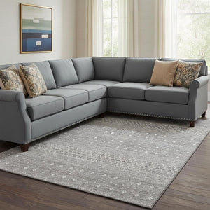 HomeRoots 10' X 14' Silver and Gray Tribal Area Rug - Washable, UV Protected, Durable for High-Traffic Spaces 657197