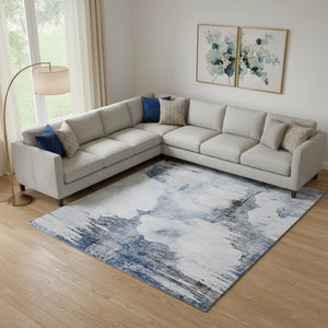 HomeRoots 9' X 12' Washable Blue Gray Ivory Abstract Area Rug with UV Protection for Stylish, Low-Maintenance Living 657214