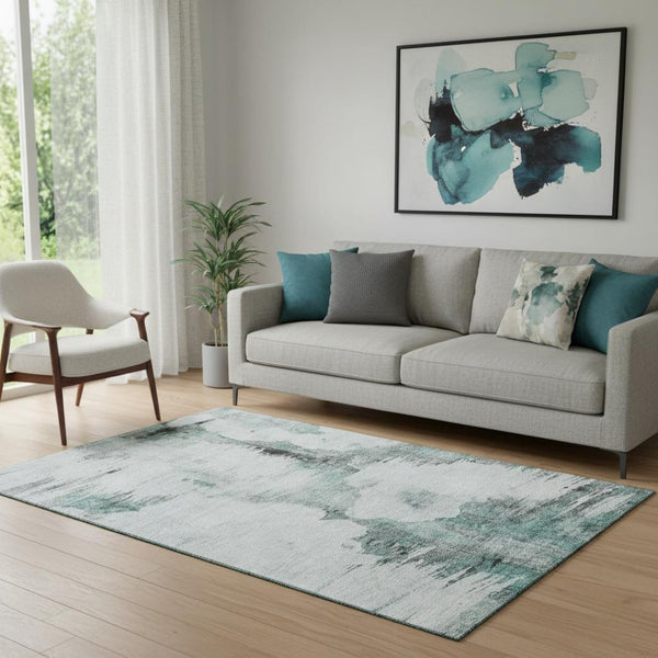 HomeRoots 5' X 8' Abstract Teal Gray Ivory Rug - Washable, UV Protected, Durable Design for Any Space! 657235