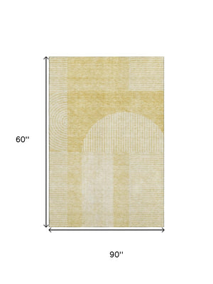 HomeRoots 5' X 8' Gold and Ivory Geometric Washable Area Rug - Modern Design with UV Protection & Stain Resistance 657259