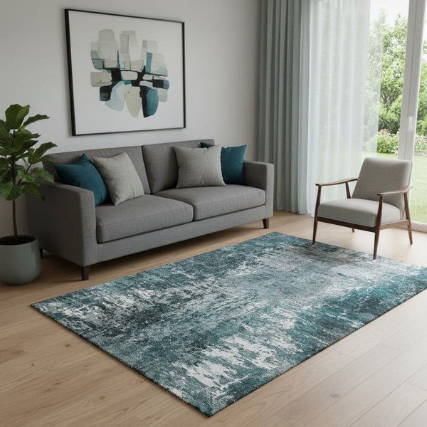 HomeRoots 5' X 8' Teal and Ivory Abstract Area Rug - Washable, UV Protected, Stain Resistant for High-Traffic Spaces 657523