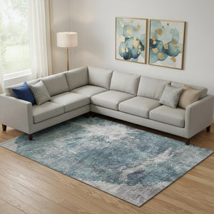 HomeRoots 9' X 12' Modern Teal and Ivory Abstract Area Rug - Washable, UV-Protected, Durable for High-Traffic Homes 657562
