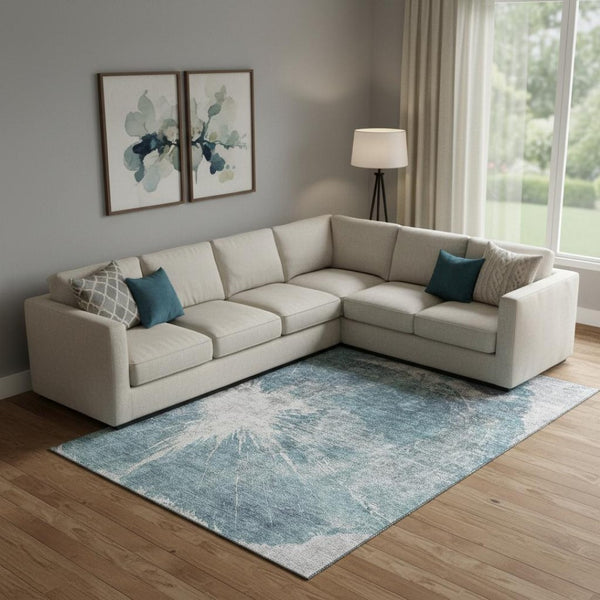 HomeRoots 10' X 14' Teal and Ivory Abstract Area Rug - Durable, Stain-Resistant, UV Protected for High-Traffic Homes 657563