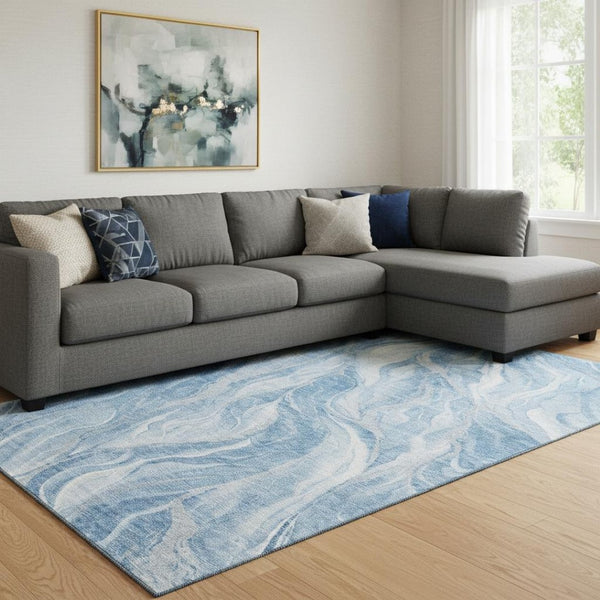 HomeRoots 9' X 12' Abstract Blue and Ivory Washable Area Rug with UV Protection for High-Traffic Spaces 657580