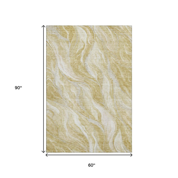 HomeRoots 5' X 8' Gold And Ivory Abstract Area Rug - Stylish, Washable, UV-Protected for Busy Homes & Pets 657583