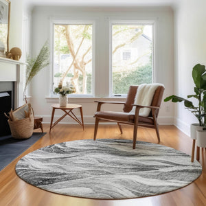 HomeRoots 8' Gray and Ivory Abstract Round Rug - Washable, UV Protected, Durable, and Stylish for Any Space 657590