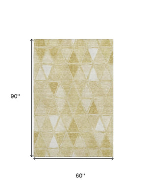HomeRoots 5' X 8' Gold and Ivory Geometric Area Rug - Stylish, Washable, UV-Protected for High-Traffic Spaces 657625