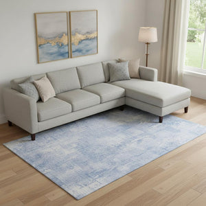 HomeRoots 9' X 12' Sky Blue and Ivory Abstract Washable Area Rug - Modern Design with UV Protection & Easy Care 657772