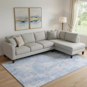 HomeRoots 10' Sky Blue & Ivory Abstract Washable Area Rug - Durable, Stain Resistant, UV Protected Design! 657773