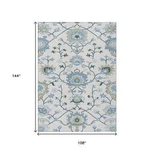 HomeRoots 9' X 12' Floral Area Rug in Ivory, Blue & Beige - Durable, Washable for Indoor and Outdoor Spaces 657965