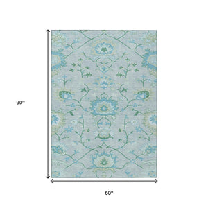 HomeRoots 5' Stylish Mint Green Floral Area Rug – Durable, Washable, Indoor/Outdoor Comfort for Any Space! 657974