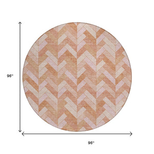 HomeRoots 8' Salmon and Ivory Round Geometric Area Rug - Washable, Durable Design for Indoor & Outdoor Use 658215