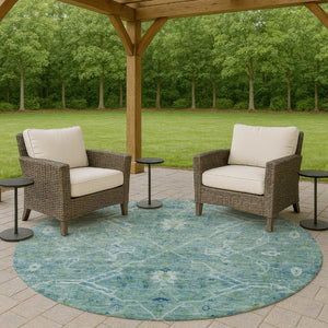 HomeRoots 8' Turquoise and Ivory Floral Round Area Rug - Stylish, Washable, Indoor/Outdoor Charm for Home 658275