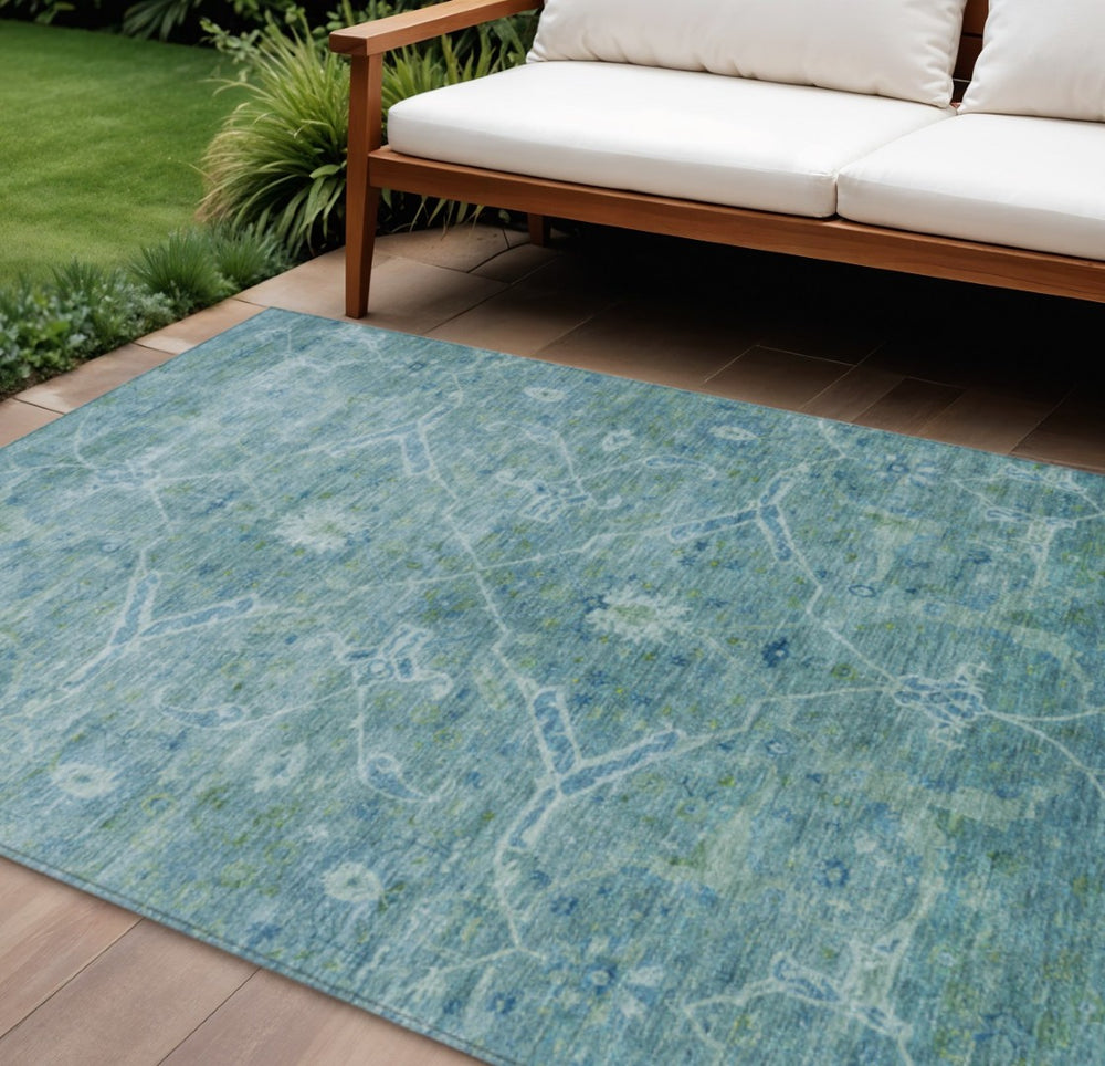 HomeRoots 8' X 10' Turquoise Floral Indoor Outdoor Rug - Durable, Washable, Stain-Resistant, Stylish Design 658276