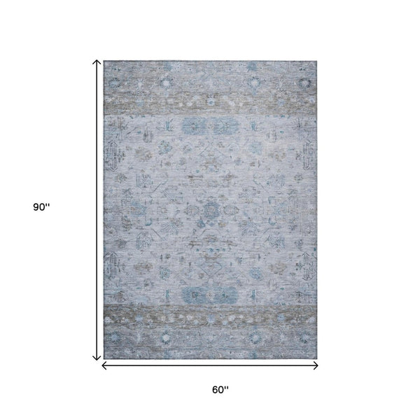 HomeRoots 5' X 8' Tribal Washable Indoor Outdoor Area Rug in Sky Blue, Gray & Ivory - Stylish & Durable Design 659325