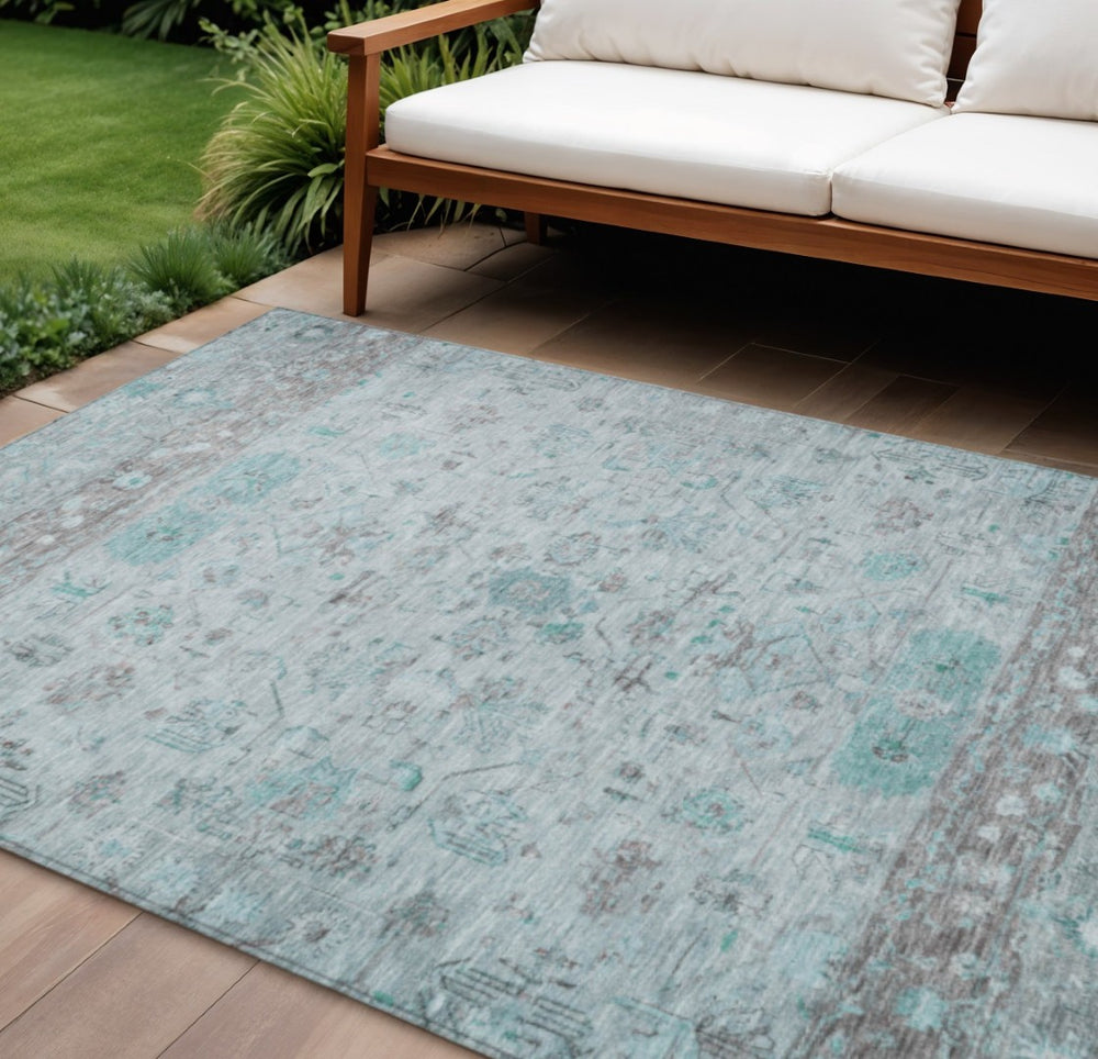 HomeRoots 8' X 10' Washable Teal Blue Gray Silver Tribal Rug - Durable Indoor Outdoor Area Rug for High Traffic Spaces 659333