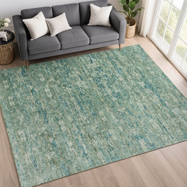 HomeRoots 5' Teal Blue & Ivory Ikat Area Rug - Stylish, Durable, Washable for Indoor/Outdoor Spaces & High Traffic 659385