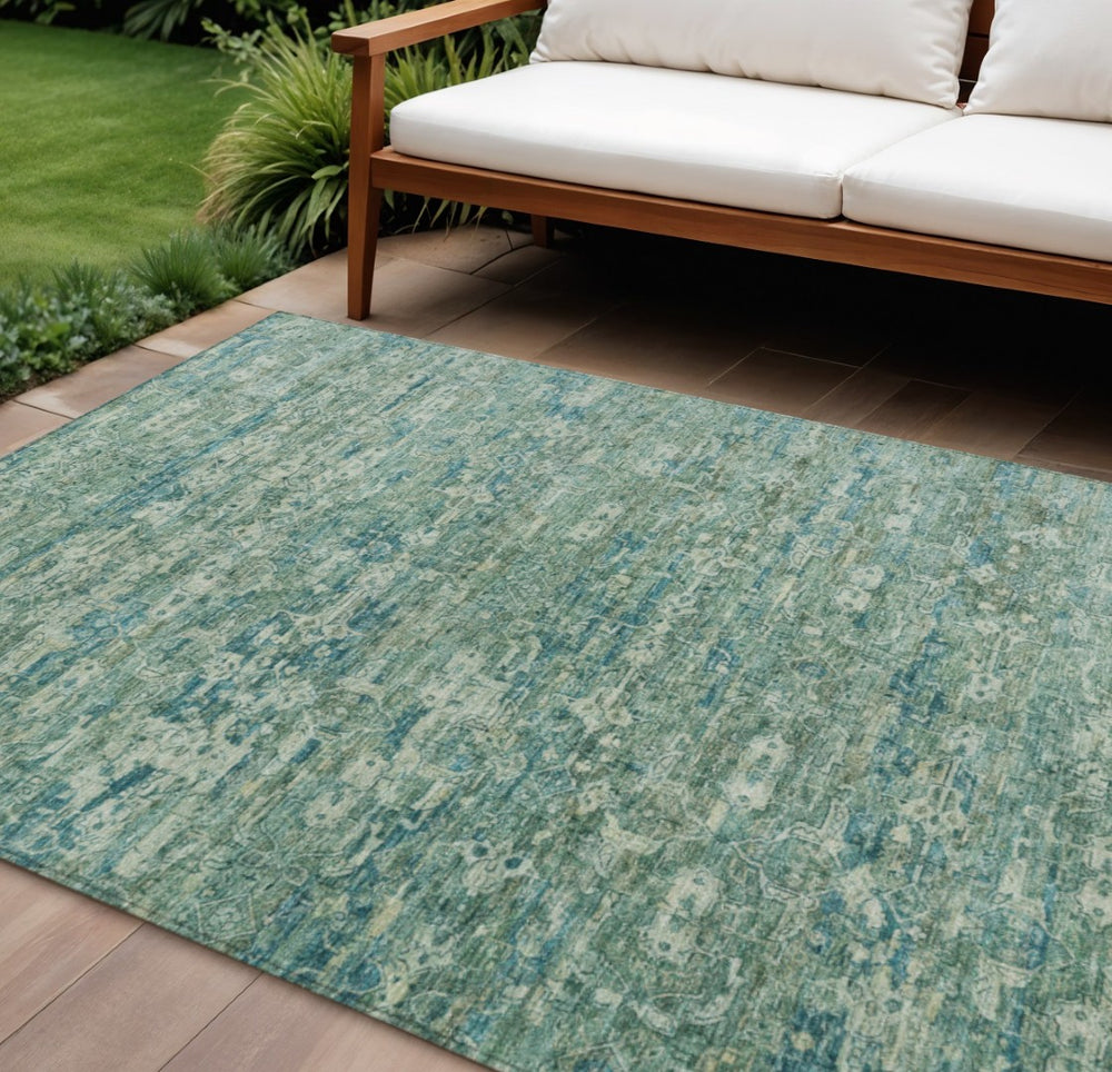 HomeRoots 8' X 10' Teal Blue and Ivory Ikat Washable Area Rug – Durable, Stylish for Indoor & Outdoor Spaces! 659387