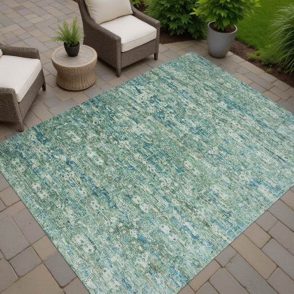 HomeRoots 8' X 10' Teal Blue and Ivory Ikat Washable Area Rug – Durable, Stylish for Indoor & Outdoor Spaces! 659387