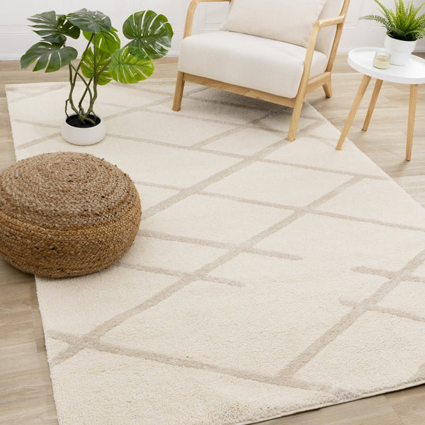 HomeRoots 5' Cream Area Rug - Soft, Stain-Resistant Polyester for Modern Comfort in Living Spaces and Play Areas 8' X 11' 660006