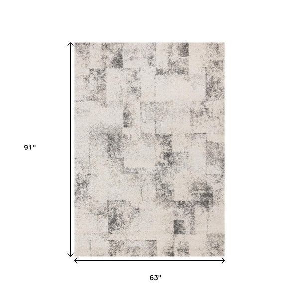HomeRoots 5' Cream and Black Abstract Area Rug - Modern Artistry Meets Durability for Stylish Living Spaces 5' X 8' 660027