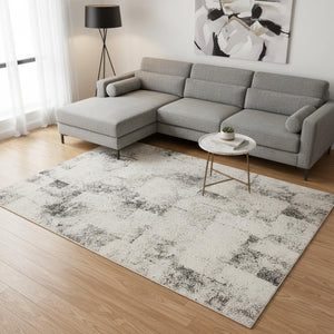 HomeRoots 5' Cream and Black Abstract Area Rug - Modern Artistry Meets Durability for Stylish Living Spaces 8' X 11' 660028