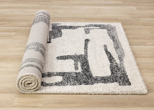 HomeRoots 5' Contemporary Beige and Black Abstract Area Rug – Plush, Durable, Perfect for Modern Homes 5' X 8' 660031