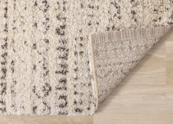 HomeRoots 5' Luxurious Cream and Brown Tribal Area Rug - Plush, Durable, and Ideal for Any Modern Space 5' X 8' 660040
