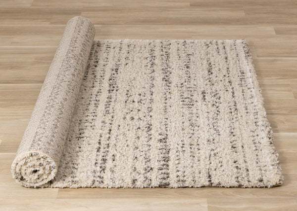 HomeRoots 5' Luxurious Cream and Brown Tribal Area Rug - Plush, Durable, and Ideal for Any Modern Space 5' X 8' 660040