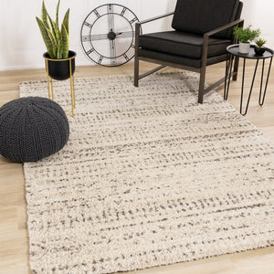 HomeRoots 5' Luxurious Cream and Brown Tribal Area Rug - Plush, Durable, and Ideal for Any Modern Space 8' X 11' 660041