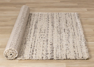 HomeRoots 5' Luxurious Cream and Brown Tribal Area Rug - Plush, Durable, and Ideal for Any Modern Space 8' X 11' 660041