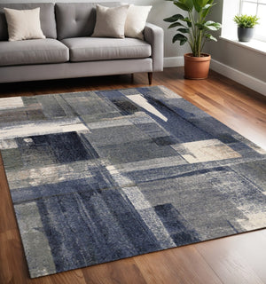 HomeRoots 5' Blue Gray and Ivory Abstract Area Rug - Contemporary Style, Stain-Resistant, Durable Design for Homes 5' X 8' 660111