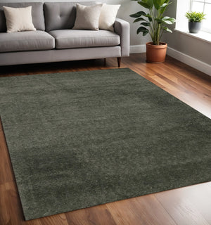HomeRoots 4' Dark Green Area Rug - Stylish, Durable, and Stain-Resistant for High-Traffic Living Spaces 5' X 8' 660124