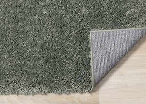 HomeRoots 4' Dark Green Area Rug - Stylish, Durable, and Stain-Resistant for High-Traffic Living Spaces 5' X 8' 660124