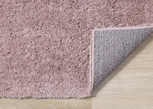 HomeRoots 4' Plush Pink Area Rug - Soft, Stylish, and Durable for Family Spaces, Perfect for Kids and Pets! 5' X 8' 660132