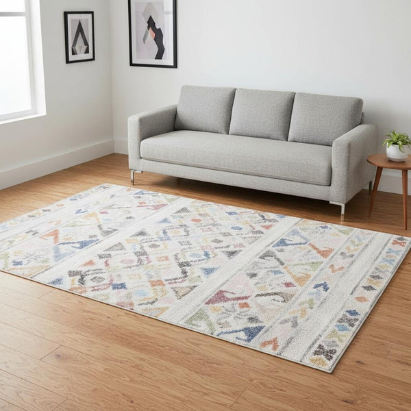 HomeRoots 5' Modern Tribal Area Rug in Cream, Blue & Green - Durable, Stain-Resistant for Family Spaces 5' X 8' 660180