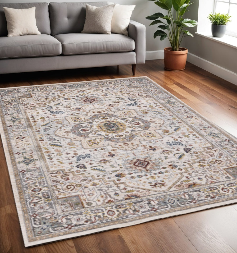 HomeRoots 5' Cream and Blue Medallion Area Rug - Durable, Stain-Resistant Soft Polyester for Timeless Style 5' X 8' 660199