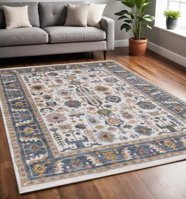 HomeRoots 5' Cream Blue and Green Medallion Area Rug - Stylish, Durable Design for Homes with Kids and Pets 5' X 8' 660203