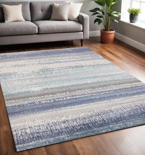 HomeRoots 5' Blue Gray and Cream Abstract Area Rug - Durable, Stain-Resistant, Modern Design for Any Space 5' X 8' 660235
