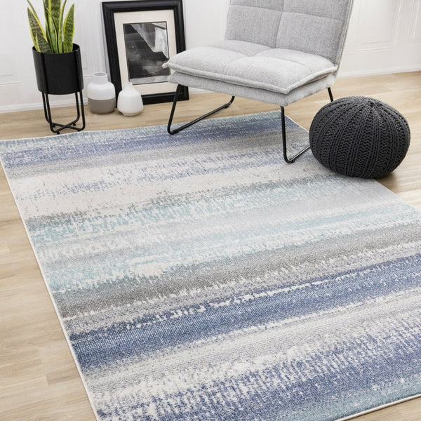 HomeRoots 5' Blue Gray and Cream Abstract Area Rug - Durable, Stain-Resistant, Modern Design for Any Space 5' X 8' 660235