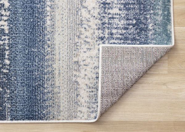HomeRoots 5' Blue Gray and Cream Abstract Area Rug - Durable, Stain-Resistant, Modern Design for Any Space 5' X 8' 660235