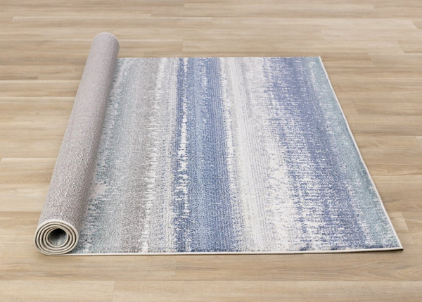 HomeRoots 5' Blue Gray and Cream Abstract Area Rug - Durable, Stain-Resistant, Modern Design for Any Space 5' X 8' 660235
