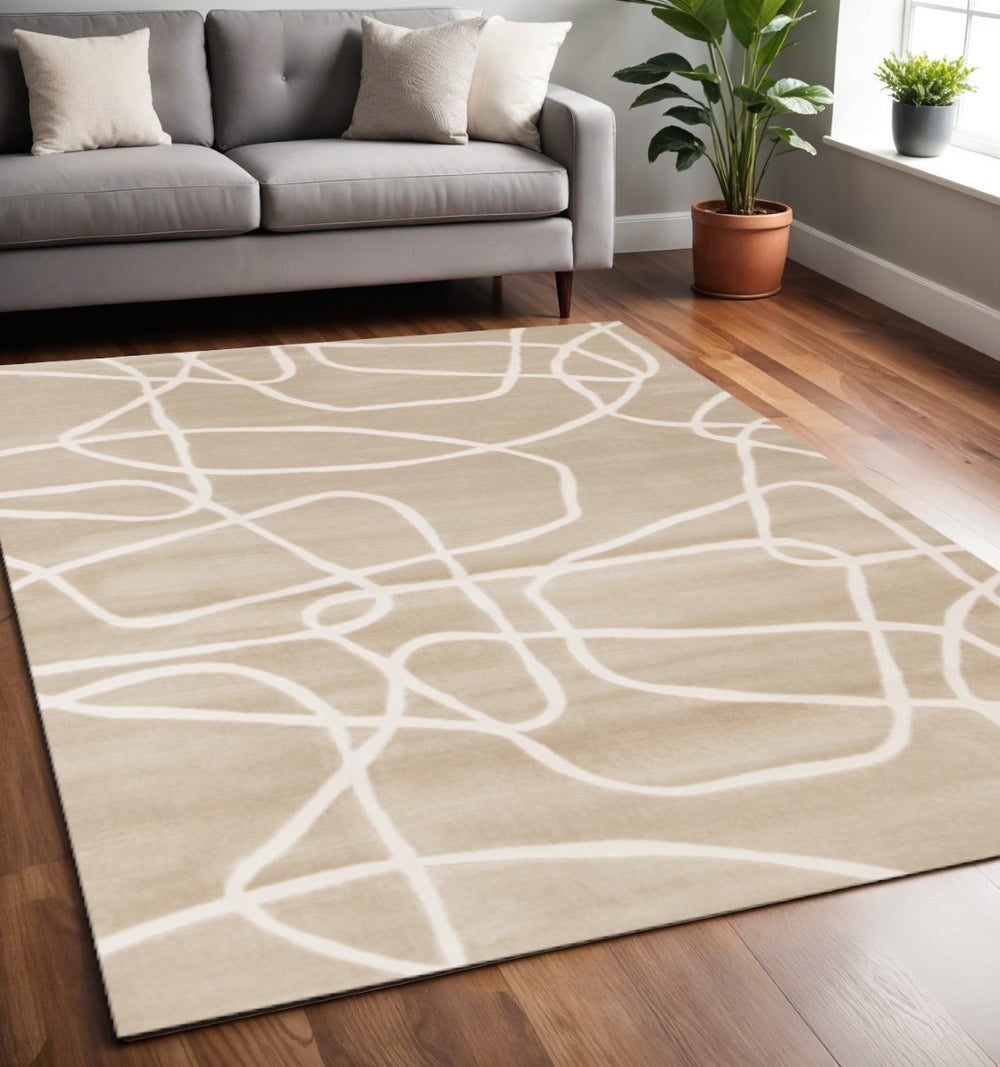 HomeRoots 5' Cream and Tan Abstract Area Rug – Modern Design, Stain Resistant, Easy-Care for Busy Homes 5' X 8' 660237