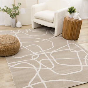 HomeRoots 8' Cream and Tan Abstract Area Rug - Modern Design, Durable, and Soft for Stylish Living Spaces 8' X 11' 660238