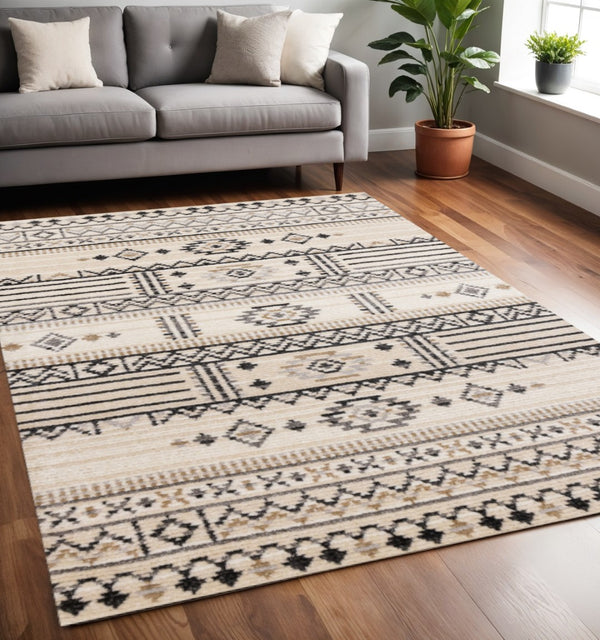 HomeRoots 5' Cream and Black Tribal Area Rug – Durable, Stylish Design for Family Rooms and Play Areas 5' X 8' 660257