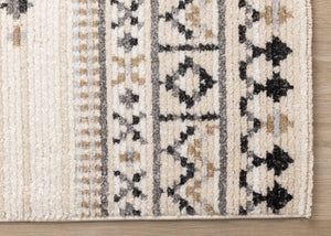 HomeRoots 5' Cream and Black Tribal Area Rug – Durable, Stylish Design for Family Rooms and Play Areas 5' X 8' 660257
