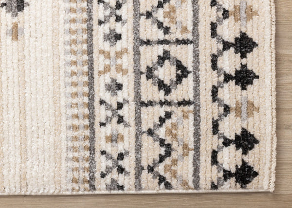 HomeRoots 5' Cream and Black Tribal Area Rug – Durable, Stylish Design for Family Rooms and Play Areas 5' X 8' 660257