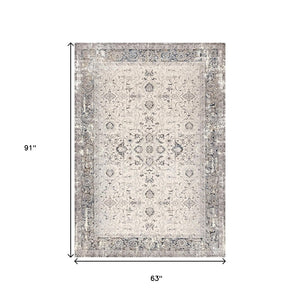 HomeRoots 5' Cream Blue and Gray Medallion Area Rug - Stylish, Durable, Stain Resistant for Any Space 5' X 8' 660265